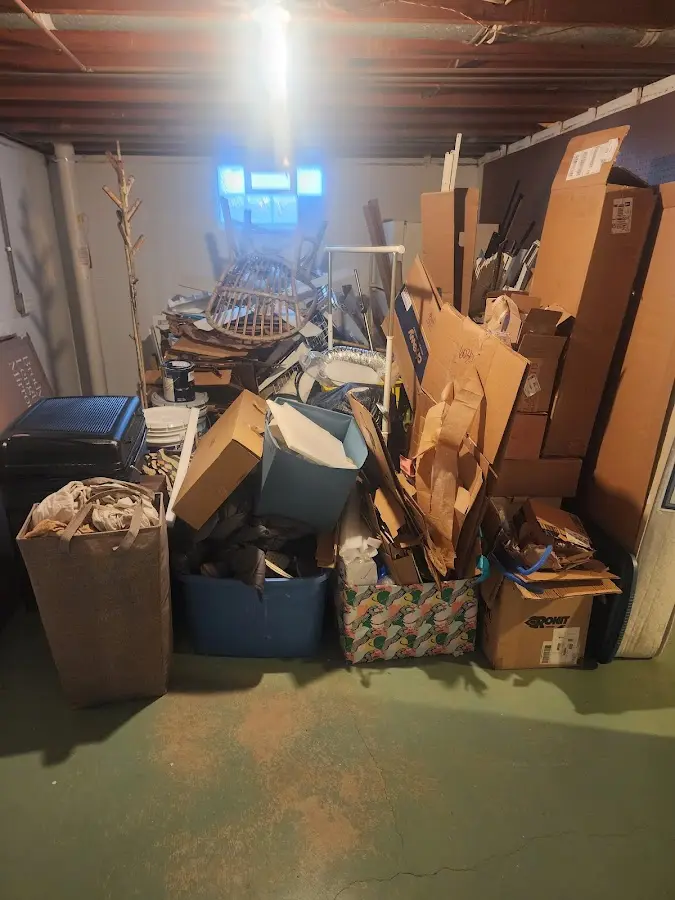 Roll-off dumpster container at job site for Yard Waste Dumpster Rental in Southbury